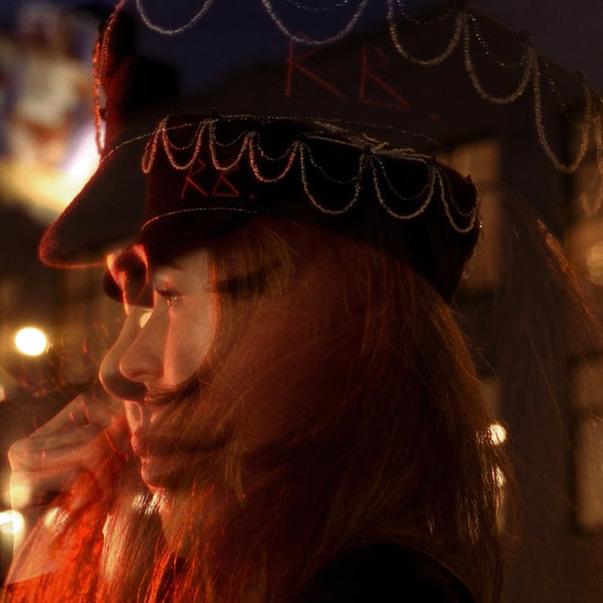 Black Ruslan Baginskiy hat featured in Emily in Paris, adding Parisian charm.